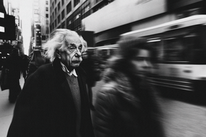 Paul Parsons AI Generated black and white image of Albert Einstein walking on a busy street