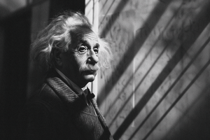 Paul Parsons AI Generated black and white image of Albert Einstein in a building where shadows are cast by the sunlight.