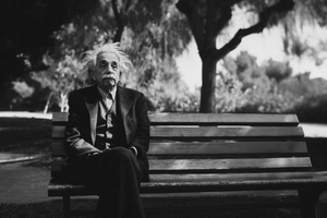 Paul Parsons AI Generated black and white image of Albert Einstein in an city park sitting on a bench